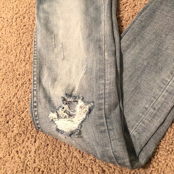 distressed skinny jeans - Picture 3 of 5